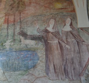 Santa Clara e sua irmã Santa Inês, seguidoras do crucificado.