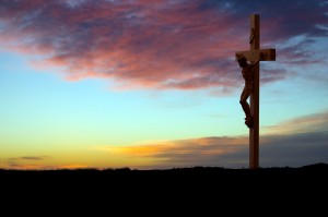 Christ on the Crucifix at Sunrise. Copy space